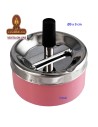 Cenicero metal rosa automático.