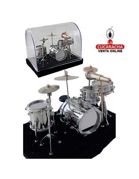 Miniatura-Bateria metal cromado y dorado en urna.